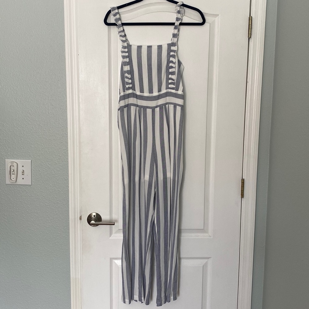 Beautiful light grey and white striped jumpsuit wide legged